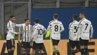 Juventus' Federico Chiesa celebrates scoring their first goal with teammates REUTERS/Alberto Lingria