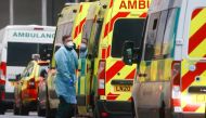 A medic stands next to an ambulance at the Royal London Hospital, amid the coronavirus disease outbreak, in London, Britain, January 5, 2021. Reuters/Hannah McKay