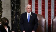 US Vice President Mike Pence reads the final certification of Electoral College votes cast in November's presidential election during a joint session of Congress at the Capitol in Washington, US, January 7, 2021. J Scott Applewhite/Pool via Reuters 