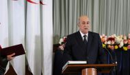 FILE PHOTO: Newly elected Algerian President Abdelmadjid Tebboune takes the oath during a swearing-in ceremony in Algiers, Algeria December 19, 2019. REUTERS/Ramzi Boudina/File Photo
