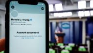 A photo illustration shows the suspended Twitter account of U.S. President Donald Trump on a smartphone at the White House briefing room in Washington, U.S., January 8, 2021. REUTERS/Joshua Roberts/Illustration
