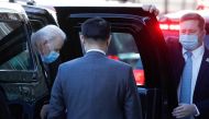 U.S. President-elect Joe Biden walks into the Queen Theatre in Wilmington, Delaware, U.S., January 10, 2021. REUTERS/Tom Brenner
