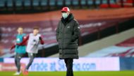 Liverpool manager Juergen Klopp wears a protective face mask during the warm up before the match Pool via REUTERS/Hannah Mckay