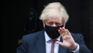 Britain's Prime Minister Boris Johnson leaves Downing Street in London, Britain January 13, 2021. REUTERS/Hannah McKay
