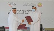 President of General Tax Authority, Ahmed bin Issa Al Mohannadi (right), and Chief Executive Officer of Qatar Finance and Business Academy, Dr. Khalid Mohammed Al Horr, during the signing ceremony in Doha recently. 