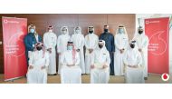 Khames Mohammed Al Naimi, Chief Human Resources Officer at Vodafone Qatar, with the Qatari employees who undertook the Telecoms MBA. 