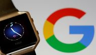FILE PHOTO: Fitbit Blaze watch is seen in front of a displayed Google logo in this illustration picture taken, November 8, 2019. REUTERS/Dado Ruvic/File Photo/File Photo
