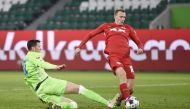 RB Leipzig's Lukas Klostermann in action with VfL Wolfsburg's Wout Weghorst Pool via REUTERS/Fabian Bimmer DFL regulations prohibit any use of photographs as image sequences and/or quasi-video.