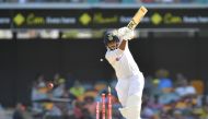 Shardul Thakur of India is clean bowled by Pat Cummins of Australia during day three of the fourth test match between Australia and India at the Gabba in Brisbane, Australia, January 17, 2021. AAP Image/Darren England via Reuters