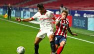 Sevilla's Marcos Acuna in action with Atletico Madrid's Kieran Trippier REUTERS/Sergio Perez