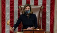 U.S. Speaker of the House Nancy Pelosi (D-CA) wields the gavel as the House of Representatives votes to impeach U.S. President Donald Trump for inciting insurrection, a week after a mob of his supporters stormed the U.S. Capitol, in this frame grab from v