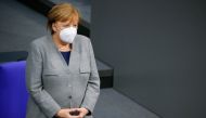 German Chancellor Angela Merkel attends a session at the lower house of parliament Bundestag on the start of the coronavirus disease (COVID-19) vaccinations, in Berlin, Germany, January 13, 2021. REUTERS/Michele Tantussi/File Photo