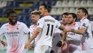 AC Milan's Zlatan Ibrahimovic celebrates scoring their second goal with teammates REUTERS/Alberto Lingria