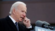 U.S. President-elect Joe Biden cries during an event at Major Joseph R. 
