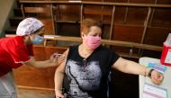 Norma Lopez, 57, gets vaccinated with the Sputnik V (Gam-COVID-Vac) vaccine at the San Martin hospital, in La Plata, on the outskirts of Buenos Aires, Argentina January 18, 2021. REUTERS/Agustin Marcarian

