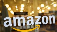 FILE PHOTO: FILE PHOTO: The logo of Amazon is seen on the door of an Amazon Books retail store in New York City, U.S., February 14, 2019. REUTERS/Brendan McDermid/File Photo
