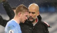 January 20, 2021 Manchester City's Kevin De Bruyne with Manchester City manager Pep Guardiola after being substituted Pool via REUTERS/Martin Rickett