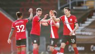 Southampton's Jan Bednarek, Jack Stephens and Theo Walcott celebrate after the match Action Images via Reuters/Andrew Boyers