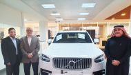 Officials from Volvo beside the first Volvo XC90 Recharge, a plug-in Hybrid electric vehicle.