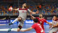 Qatar’s Frankis Marzo prepares to score against Bahrain during their IHF Handball World Championship Main Round Group 2 match, yesterday.