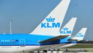 KLM airplanes are seen parked at Schiphol Airport in Amsterdam, Netherlands, April 2, 2020. Reuters/Piroschka van de Wouw/File Photo