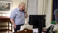 British Prime Minister Boris Johnson speaks to U.S. President Joe Biden from London, Britain, in this social media image obtained on January 23, 2021. Downing Street Handout /Crown copyright 2021/via Reuters 