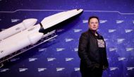 FILE PHOTO: SpaceX owner and Tesla CEO Elon Musk poses after arriving on the red carpet for the Axel Springer award, in Berlin, Germany, December 1, 2020. REUTERS/Hannibal Hanschke/Pool
