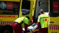 FILE PHOTO: Health workers unload a stretcher with a patient from an ambulance in the emergency unit at 12 de Octubre hospital amid the coronavirus disease (COVID-19) pandemic, in Madrid, Spain, September 4, 2020. REUTERS/Sergio Perez
