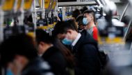 People wearing face masks are seen on a subway following an outbreak of the coronavirus disease (COVID-19) in Shanghai, China January 25, 2021. REUTERS/Aly Song