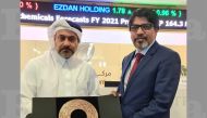 Chief Executive Officer at QFC Authority, Yousuf Mohamed Al Jaida and Ambassador of Bangladesh to Qatar, Md. Jashim Uddin with a memento.