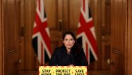 Britain's Home Secretary Priti Patel speaks during a news conference about the ongoing situation with the coronavirus disease (COVID-19) pandemic, inside 10 Downing Street, in London, Britain January 21, 2021. Matt Dunham/Pool via REUTERS

