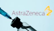 FILE PHOTO: A vial and sryinge are seen in front of a displayed AstraZeneca logo in this illustration taken January 11, 2021. REUTERS/Dado Ruvic/Illustration/File Photo

