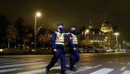 Police officers patrol during a night-time curfew imposed by the Hungarian government to curb the spread of the coronavirus, in Budapest, Hungary, November 11, 2020. REUTERS/Bernadett Szabo/File Photo/File Photo