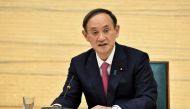 FILE PHOTO: Japanese Prime Minister Yoshihide Suga speaks during a meeting of the coronavirus disease (COVID-19) infection control headquarters at the prime minister's office in Tokyo, Japan January 22, 2021. Kazuhiro Nogi/Pool via REUTERS/File Photo
