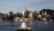 A Star Ferry boat crosses Victoria Harbour in front of a skyline of buildings in Hong Kong, China June 29, 2020. Reuters/Tyrone Siu/File Photo