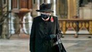 FILE PHOTO: Queen Elizabeth attends a ceremony in London's Westminster Abbey to mark the centenary of the burial of the Unknown Warrior, in Britain November 4, 2020. Picture taken November 4, 2020. Aaron Chown/Pool via REUTERS