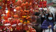 Customers wearing face mask shop for decorations, ahead of the Chinese Lunar New Year, following the coronavirus disease (COVID-19) outbreak, in Hong Kong, China January 28, 2021. REUTERS/Tyrone Siu
