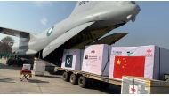 A general view of the first consignment of the coronavirus disease (COVID-19) vaccines from China, seen offloading from a plane at the Noor Khan Airbase Rawalpindi, Pakistan in this handout photo released by Inter Services Public Relations (ISPR) on Febru