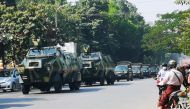Myanmar Army armored vehicles drive past a street after they seized power in a coup in Mandalay, Myanmar February 2, 2021. REUTERS/Stringer 