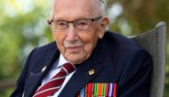 Captain Sir Tom Moore smiles as he launches his autobiography book 'Tomorrow will be a Good Day' at his home in Milton Keynes, Britain September 17, 2020. REUTERS/Dylan Martinez/File Photo