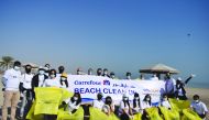 Participants during the beach clean-up drive organised by Carrefour Qatar in Al Wakra. 