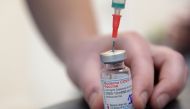 A medical worker prepares a syringe with a dose of the Moderna COVID-19 vaccine at a vaccination center in Brussels, as part of the coronavirus disease (COVID-19) vaccination campaign in Belgium, February 2, 2021. REUTERS/Johanna Geron