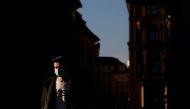 A man wearing a face mask walks on a street amid the coronavirus disease (COVID-19) outbreak in Prague, Czech Republic, January 31, 2021. REUTERS/David W Cerny