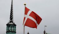 FILE PHOTO: Denmark's national flag flutters in Copenhagen, Denmark, October 22, 2019. REUTERS/Andreas Mortensen