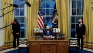 U.S. President Joe Biden prepares to sign executive orders on immigration at the White House in Washington, U.S., February 2, 2021. REUTERS/Tom Brenner
