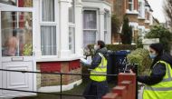 Volunteers go door-to-door handing out coronavirus disease home test kits in an effort to halt the spread of the new SARS-CoV-2 variant, in Ealing, West London, Britain February 3, 2021. Reuters/Henry Nicholls