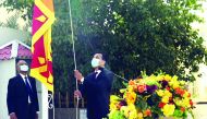 Sri Lanka's Ambassador-designate M. Mafaz Mohideen hoisting the national flag.  