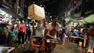 People attend a night protest against the military coup in Yangon, Myanmar February 5, 2021. REUTERS/Stringer
