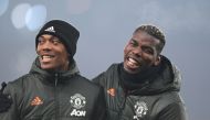 Manchester United's Paul Pogba and Anthony Martial during the warm up before the match Pool via REUTERS/Laurence Griffiths 