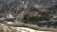 A view of damaged dam after a Himalayan glacier broke and crashed into the dam at Raini Chak Lata village in Chamoli district in the northern state of Uttarakhand, India, February 7, 2021. REUTERS/Stringer